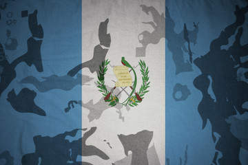 Wall Mural - flag of guatemala on the khaki texture . military concept