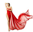 © inarik - Woman Sexy Body in Red Flying Silk Fabric, Fashion Beauty Model Naked Leg, White Isolated