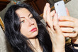 © Equatore - Beautiful brunette responds to congratulations on Women s Day