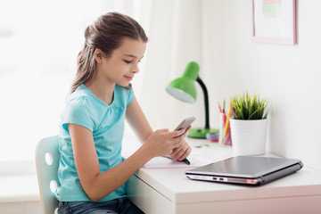 Sticker - girl with laptop and smartphone texting at home