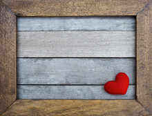Red Heart In Wooden Frame On Wood Background, Valentine Concept
