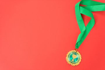 Wall Mural - gold medal on red background