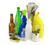 Household Recyclables, Isolated On Pure White Background. Recyclable Items Include Paper, Plastic, Metal, And Glass. 