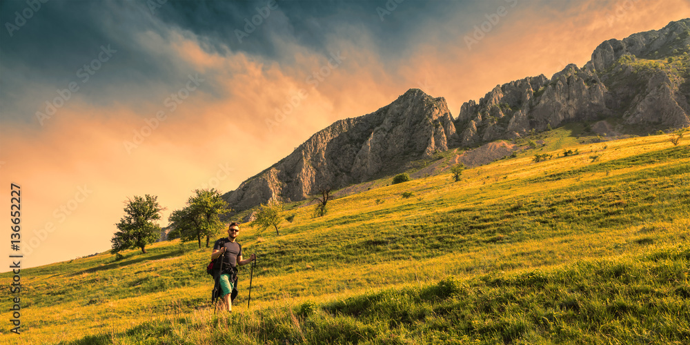 Man Hiking in Green Mountains - obrazy, fototapety, plakaty 