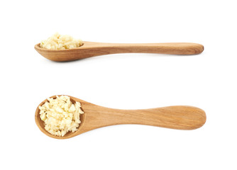 Wall Mural - Spoon of minced garlic isolated