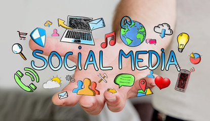 Canvas Print - man holding hand drawn social media presentation