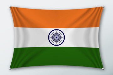 Canvas Print - india national flag. symbol of the country on a stretched fabric with waves attached with pins. real