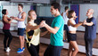 © JackF - Dancing couples learning salsa