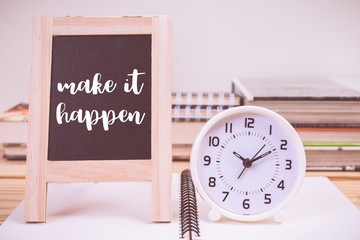 Make it happen on blackboard and clock with vintage color effect