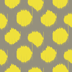 Ikat bold dots vector seamless pattern. Abstract geometric background for fabric, print or wrapping paper. Beige taupe and yellow design.