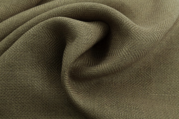 khaki background luxury cloth or wavy folds of grunge silk texture satin velvet