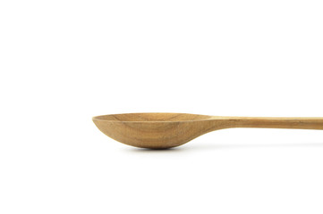 Wall Mural - Kitchen wooden spoon isolated on a white background. Selective focus.