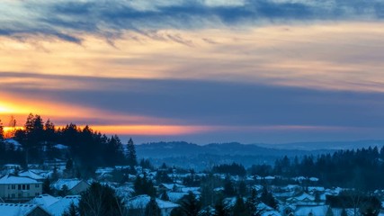 Wall Mural - Time lapse movie of beautiful sunset over suburban residential homes in Happy Valley Oregon on a snowy winter evening 4096x2304 4k uhd