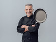 © stokkete - Chef posing with a pan