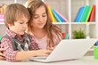 © aletia2011 - Boy and girl using laptop