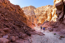 Couple People Hiking Walking Stone Desert Trail Backpacking Travel