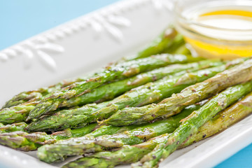 Wall Mural - Roasted Asparagus on a White Plate