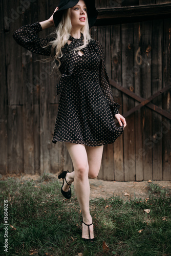 Beautiful Attractive And Stylish Girl Wearing Black Hat Standing