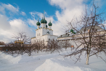 Rostov Kremlin in winter day. Church of St. Gregory the Theologian and the House - view from the garden of the Metropolitan