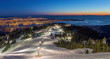 Grouse Mountain ski resort with a beautiful view of Vancouver city, British Columbia, at dusk