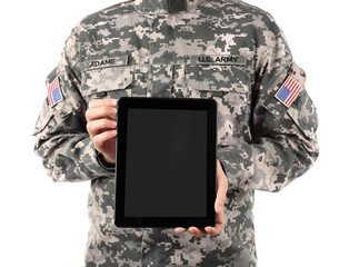 Canvas Print - Soldier holding tablet. Military education concept