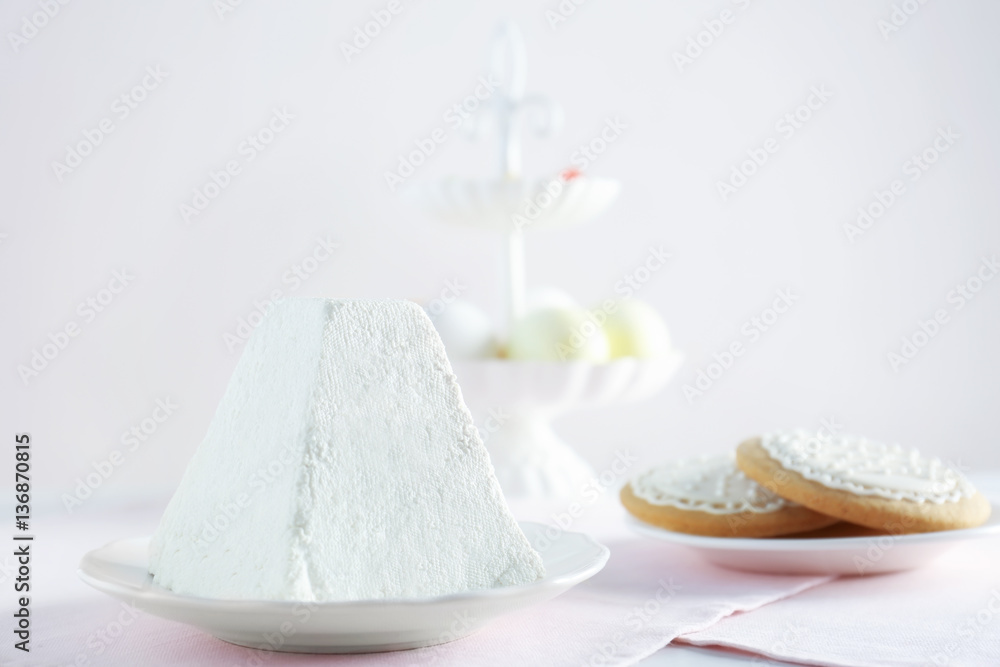 Traditional curd Easter cake on light table