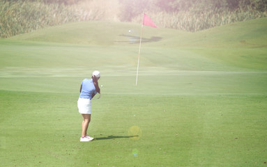 Wall Mural - Women's golf is a sport that requires endurance.