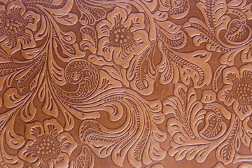 leather embossed floral pattern.