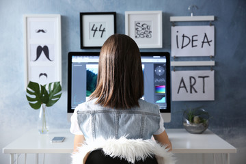 Woman working on computer at home