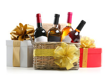 St. Valentines Day Concept. Wine Bottles In Basket And Gift Boxes Isolated On White