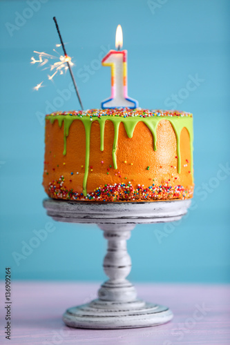 First Birthday Cake With Candle And Sparkler On Color Background Buy This Stock Photo And Explore Similar Images At Adobe Stock Adobe Stock