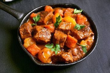 Wall Mural - Beef stew in frying pan