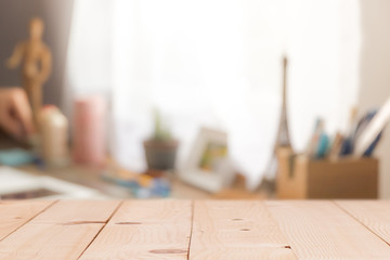 Wall Mural - Wooden table on defocused curtain window and stationery box with