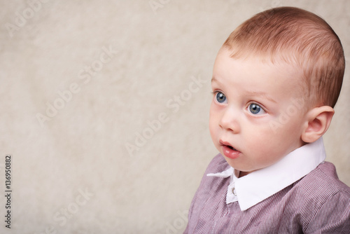 Beautiful Baby Boy Wearing Collared Shirt Looking Into Copy Space