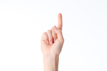 Female Hand Showing The Gesture With Raised Up One Finger Isolated On White Background