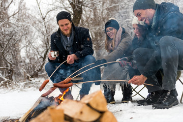 Wall Mural - Making a barbecue in winter