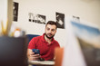 © FotoAndalucia - Man working in office looking smartphone