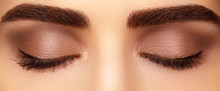 Perfect Shape Of Eyebrows And Extremly Long Eyelashes. Macro Shot Of Fashion Eyes Visage. Before And After