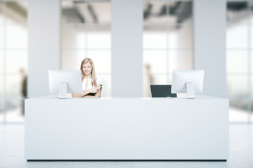 Wall Mural - Woman at reception desk