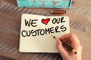Wall Mural - handwritten text we love our customers