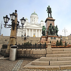 Wall Mural - HELSINKI, FINLAND - april, 4, 2016: St. Nicholas Church and a monument of Alexander II on the Senatorial area in Helsinki, Finland.