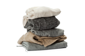 Wall Mural - Stack of clothes on white background, closeup