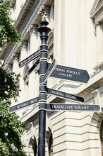 Street Signpost Giving Directions To National Gallery, Trafalgar Square And Piccadilly Circus In London, England, UK