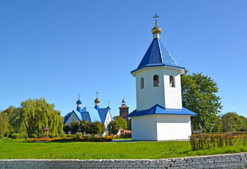 Wall Mural - View of a belltower and church in honor of an icon of the Mother of God 