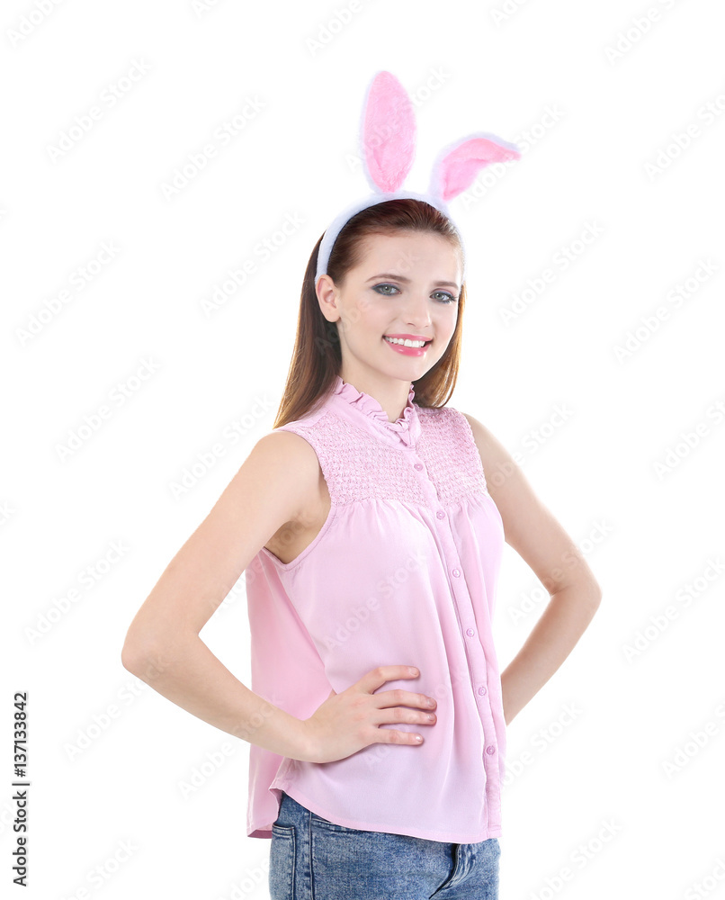 Beautiful girl with bunny ears on white background