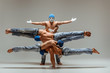 © master1305 - The group of gymnastic acrobatic caucasian men on balance pose