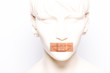 canvas print picture - Gesicht mit Pflaster vor dem Mund
