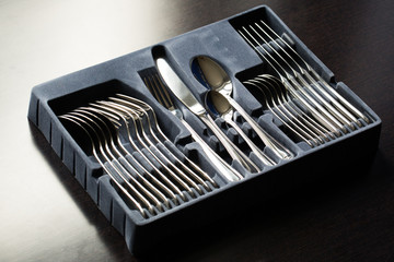 Blue flatware box isolated on black background