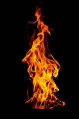 Fire flame isolated on black isolated background - Beautiful yellow, orange and red and red blaze fire flame texture style.