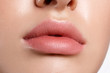 © garneg - Perfect natural lip makeup. Close up macro photo with beautiful female mouth. Plump full lips.